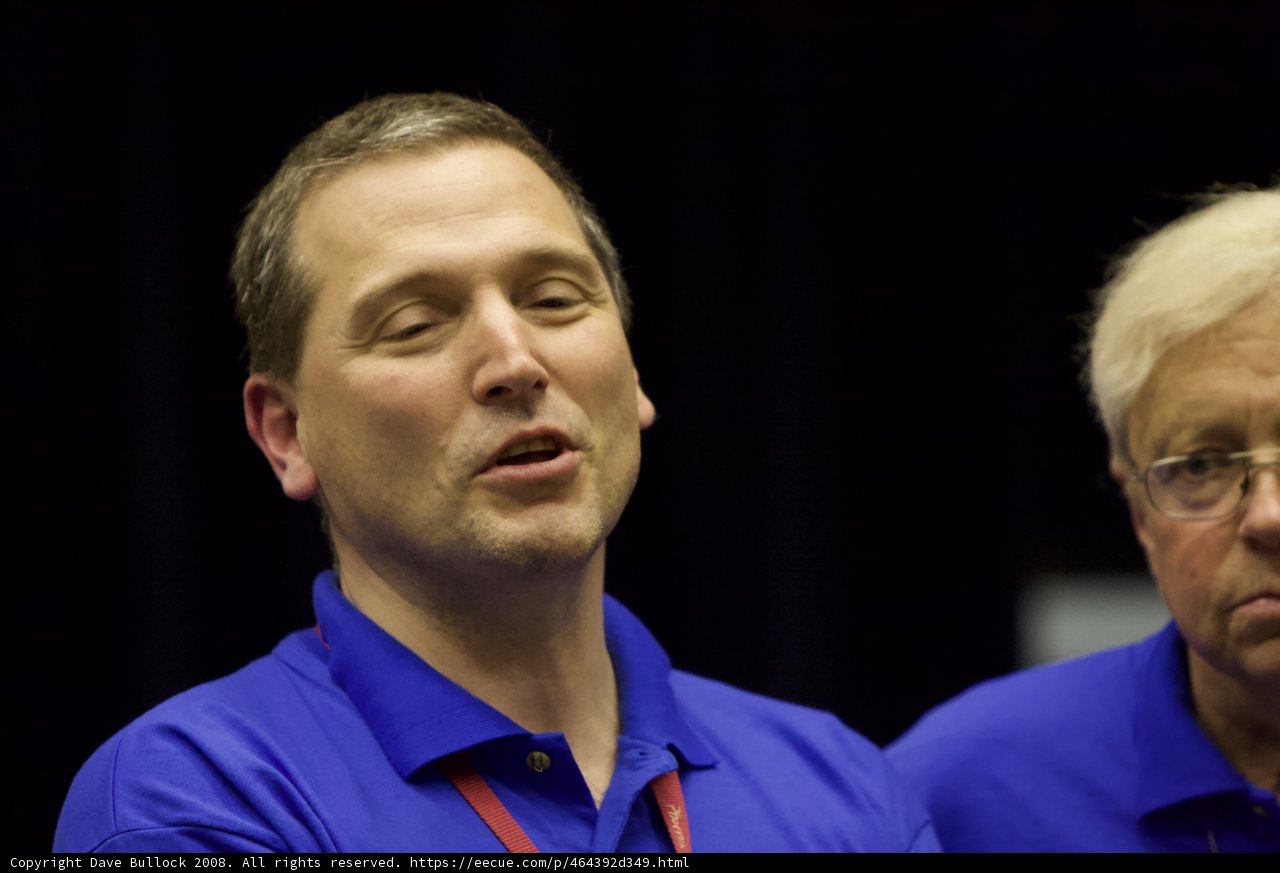 Blue Shirted Men Chatting