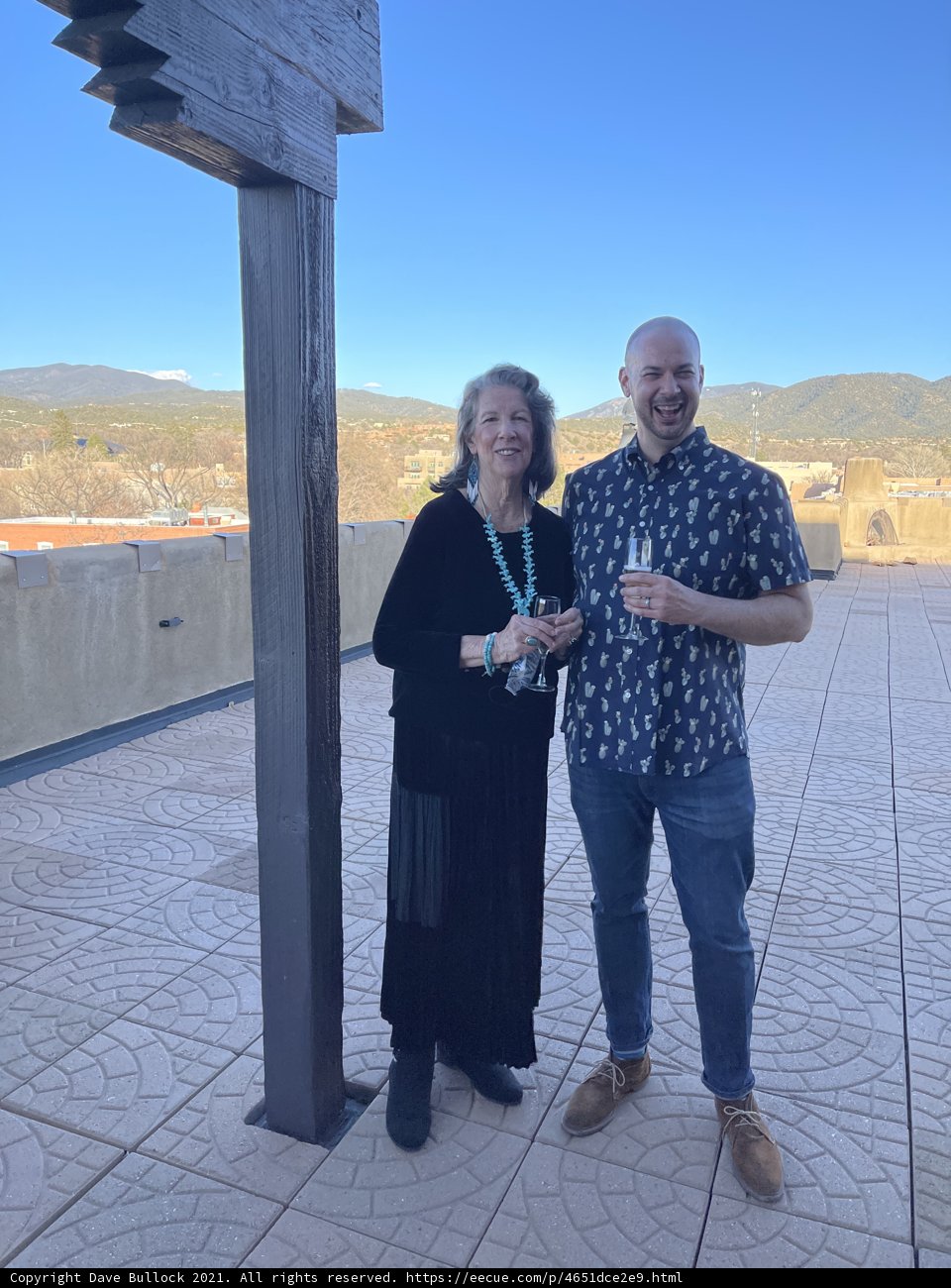 A Portrait of Two People Standing on a Patio in Santa Fe