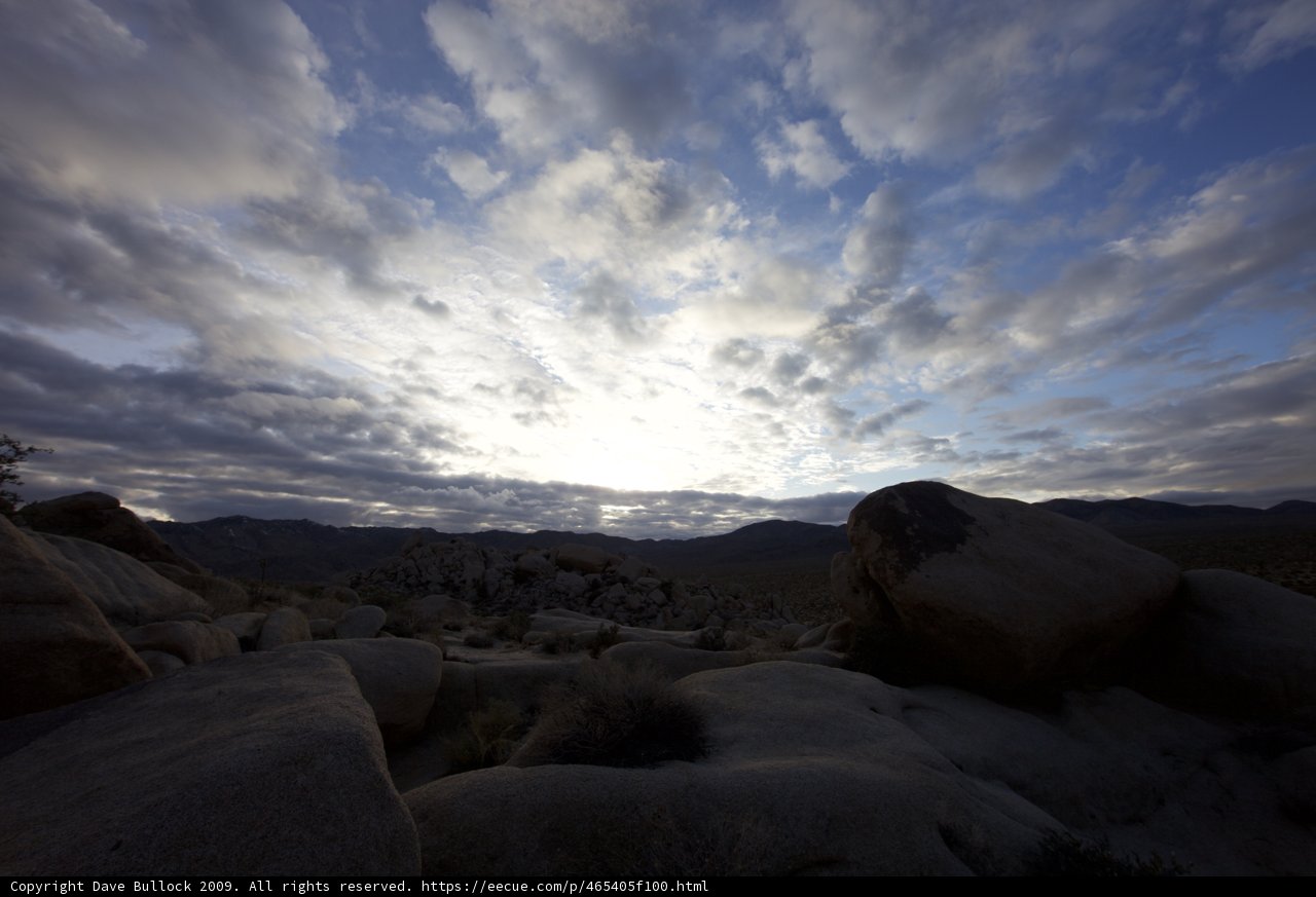 Sun rays over rocky plateau