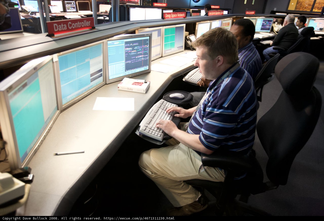 Man in a High-Tech Control Room