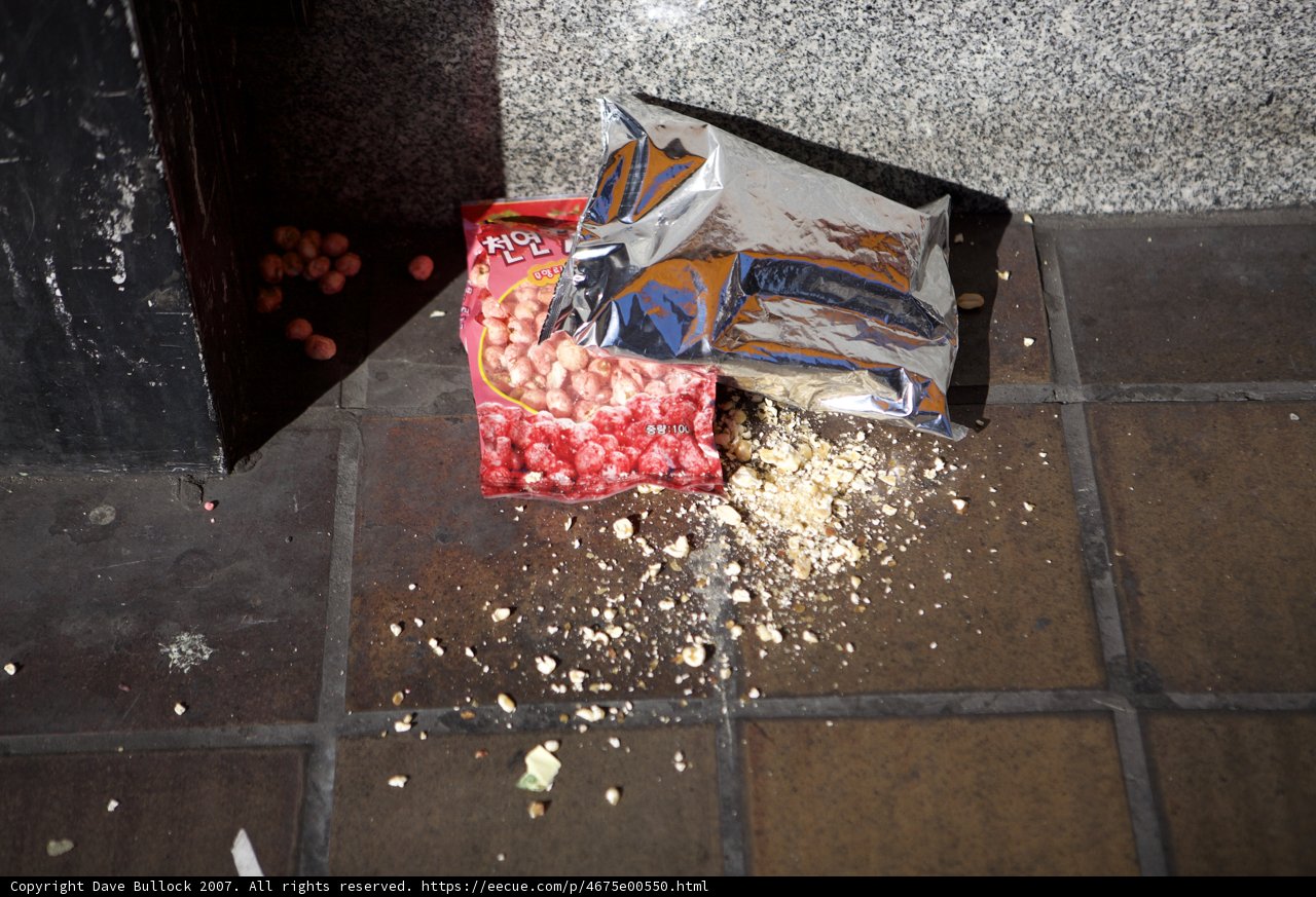 Littered Snacks on Downtown Walkway