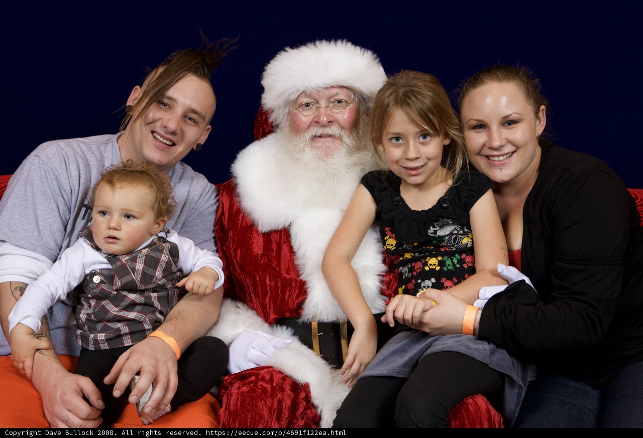 A Festive Family Portrait with Santa Claus