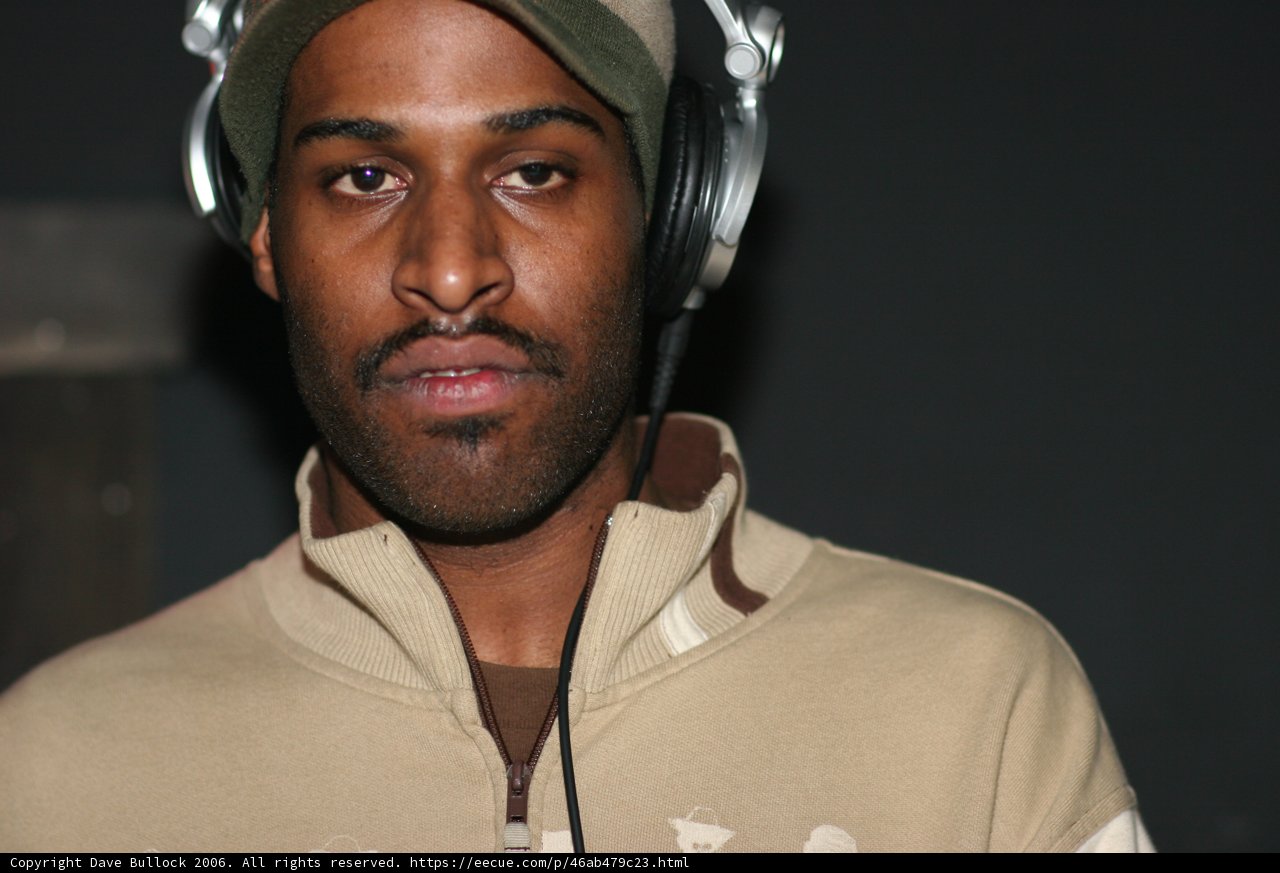 Brown Jacket and Headphones