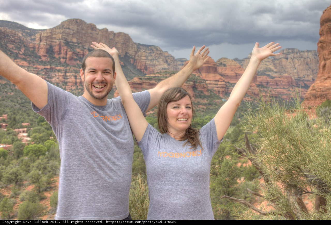 Joyful Couple Celebrating Atop Sedona Red Rocks