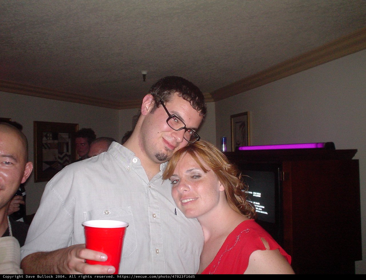 Dave and Penelope Posing Together at House Party