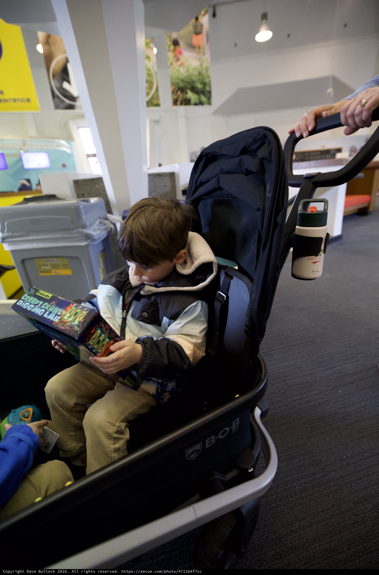 Young Reader in Stroller at Modern Museum