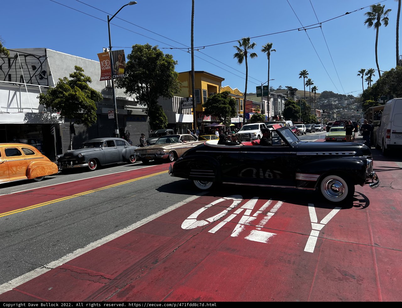 Vintage Blue Convertible on the City Streets