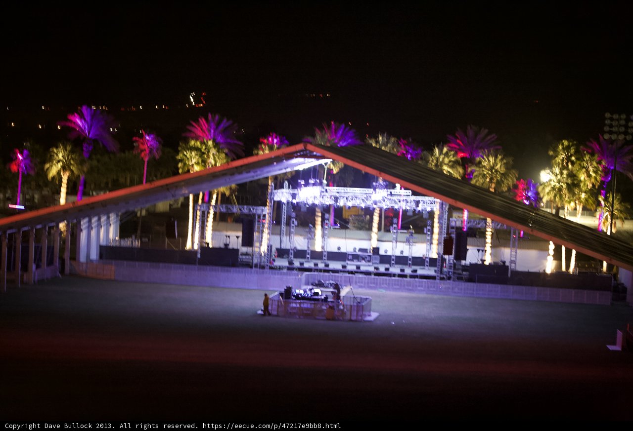 Illuminated Stage in Palm Tree Oasis
