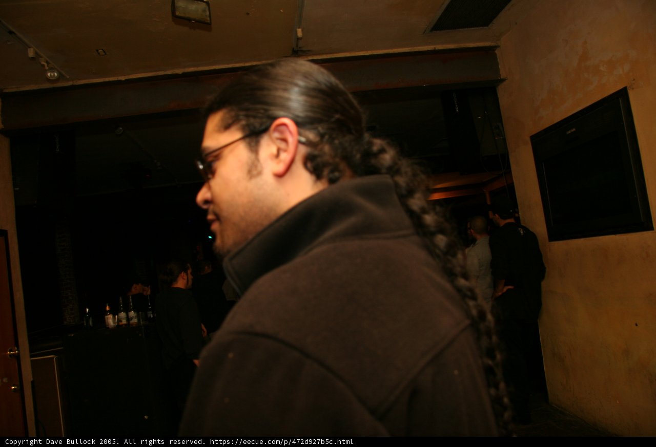 Long-haired man at the pub