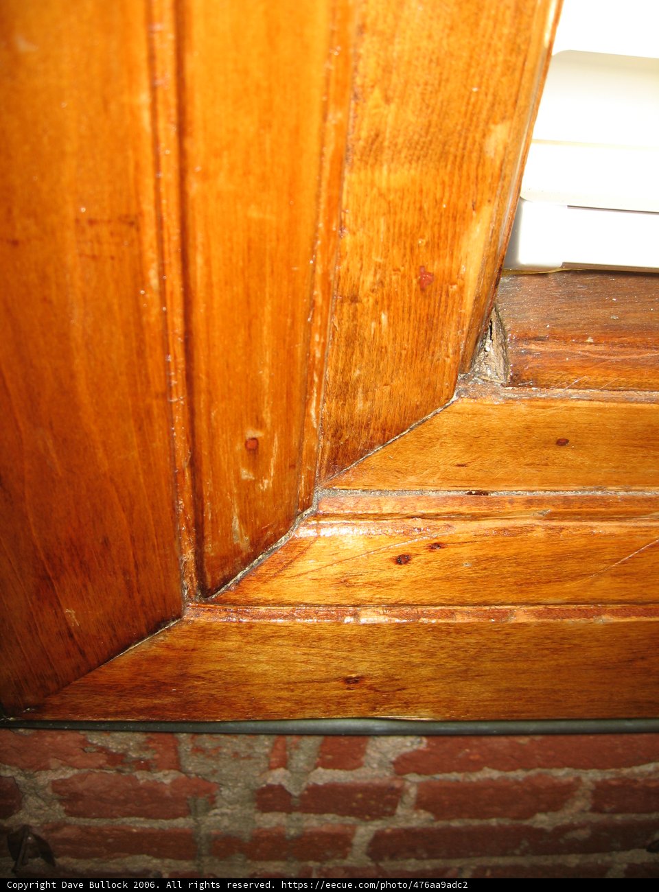 Cat on a Wooden Window Sill
