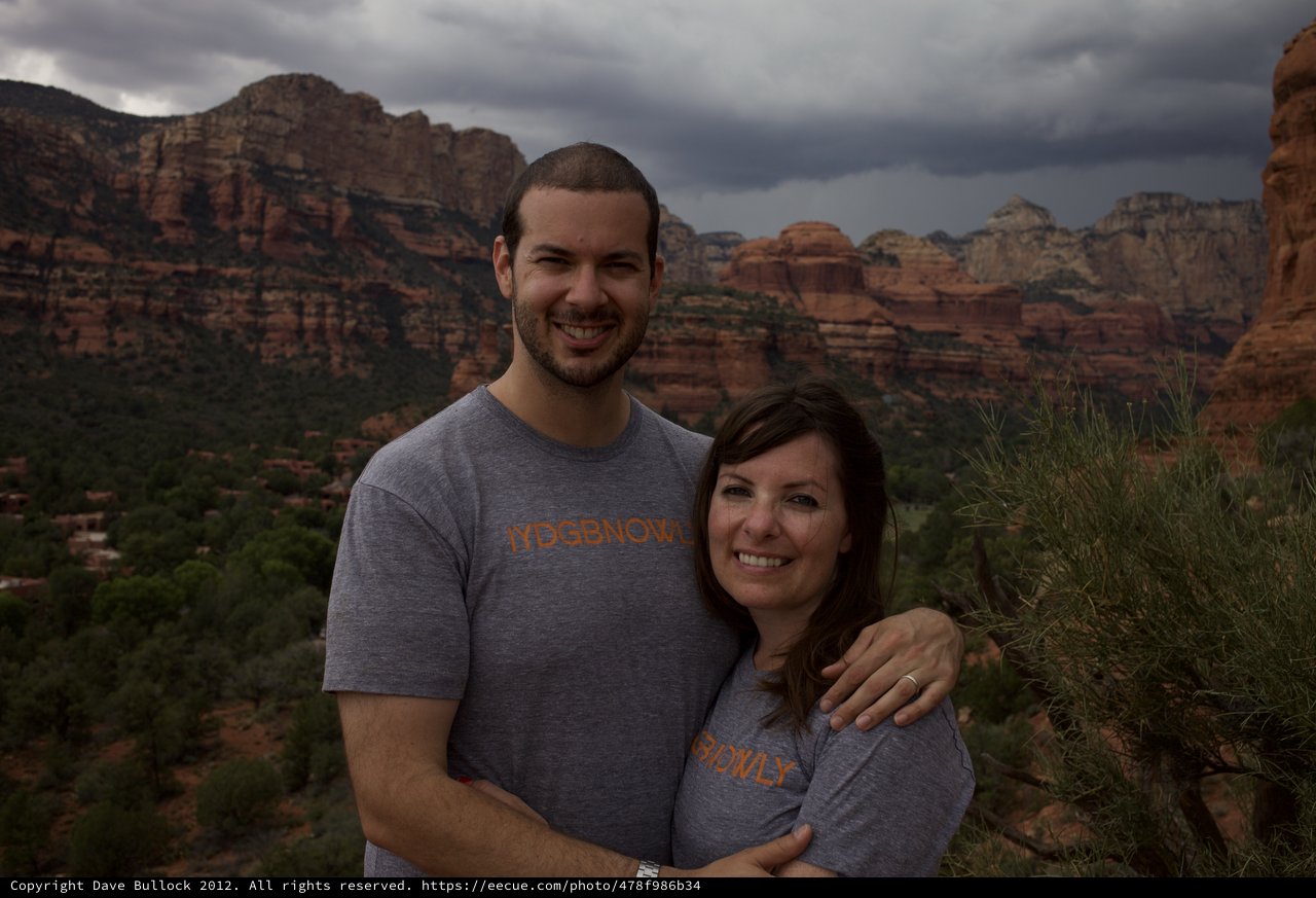 Couple Smiling Against Sedona Red Rock Backdrop