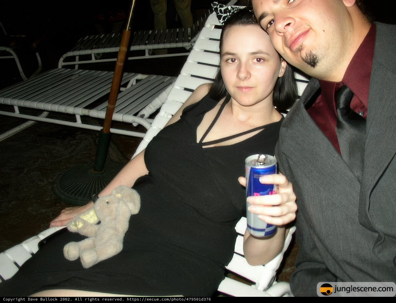 A Formally Dressed Couple Enjoys a Drink
