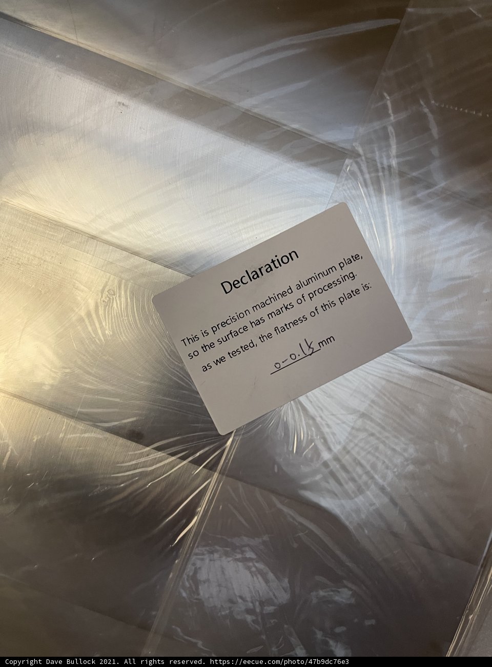 Business Card Attached to Metal Surface