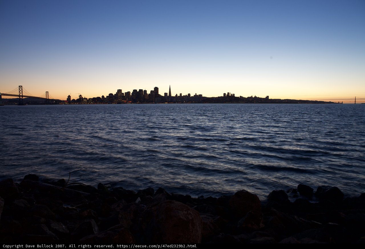 Urban Sunrise Over Water