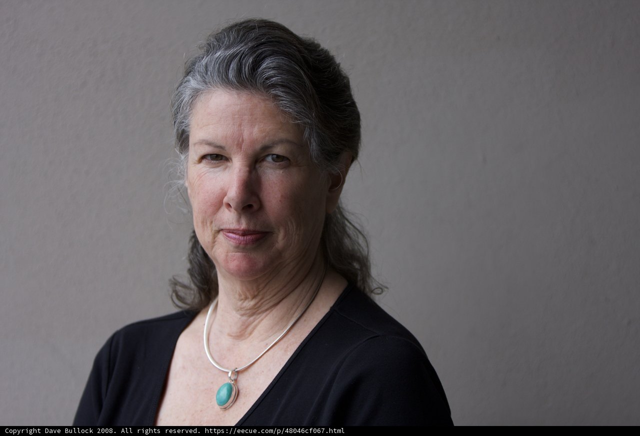 Elegant Gray-haired Woman with Necklace