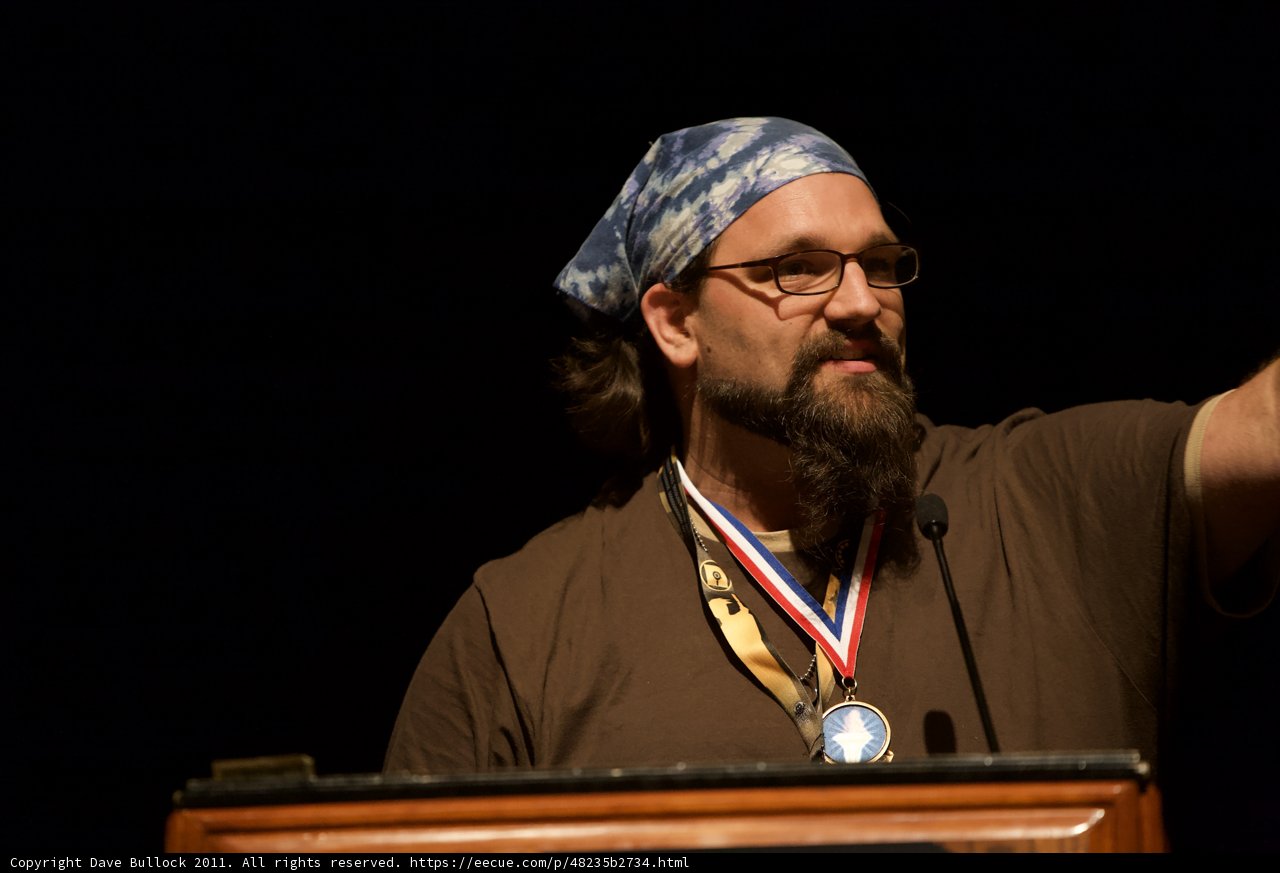 Medal-Winning Bearded Man
