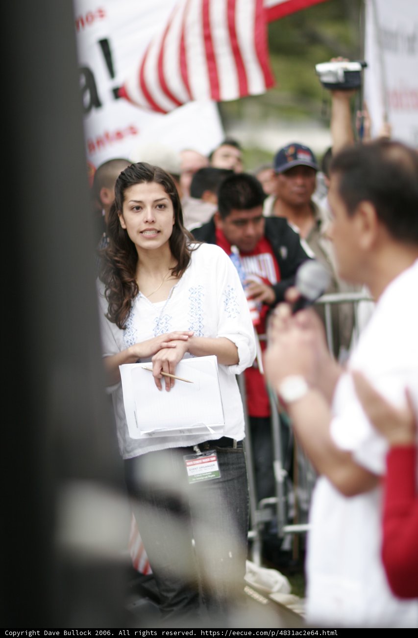 Woman in a White Shirt Joins the Protest