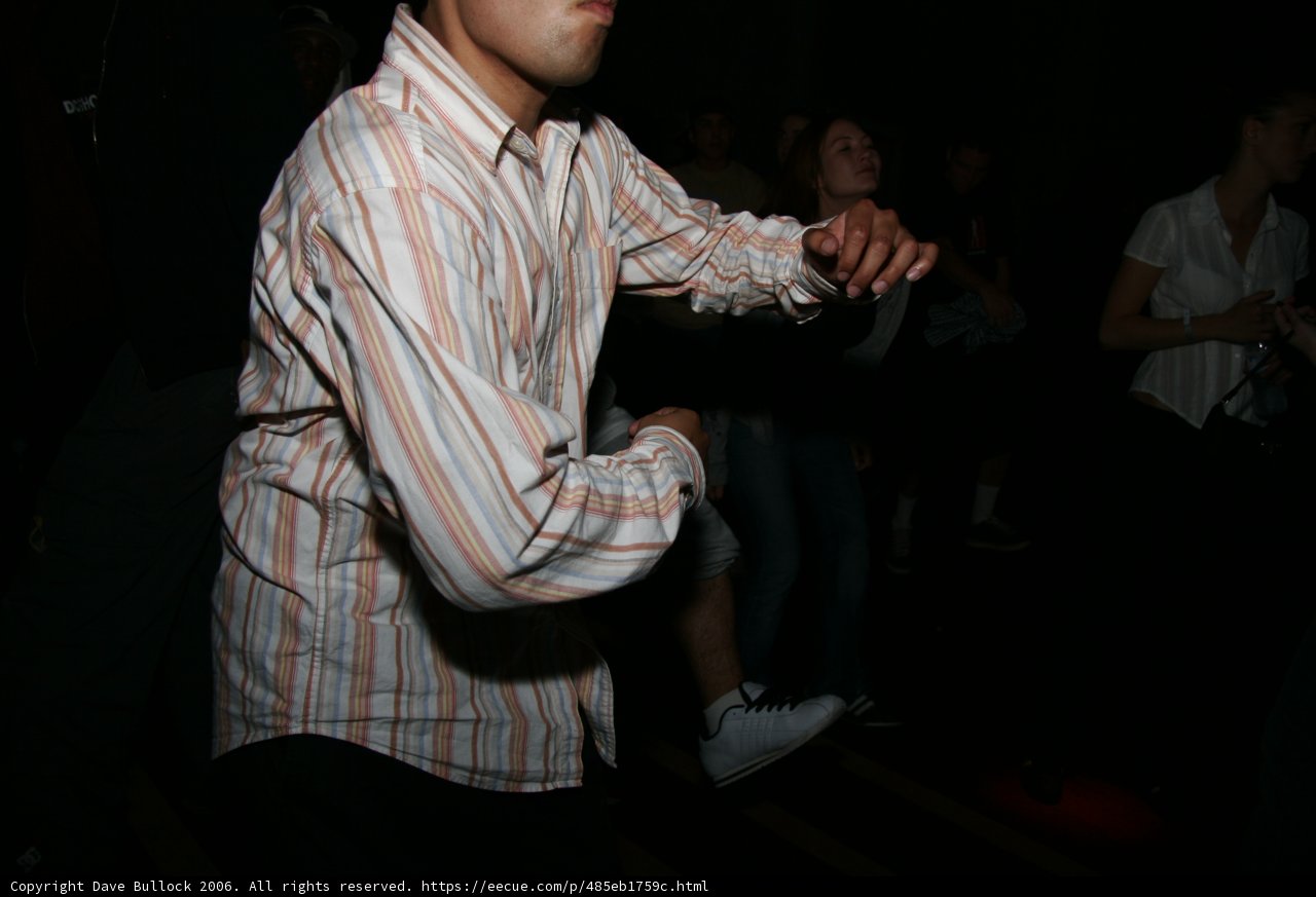 Striped Shirted Man on the Dancefloor