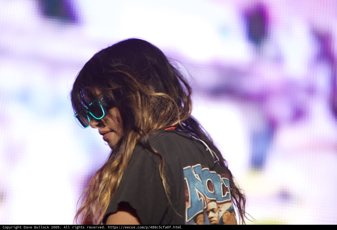 Woman with Long Hair and Sunglasses on Stage