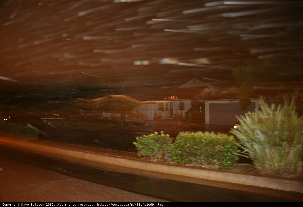 Nighttime blur with house in the background