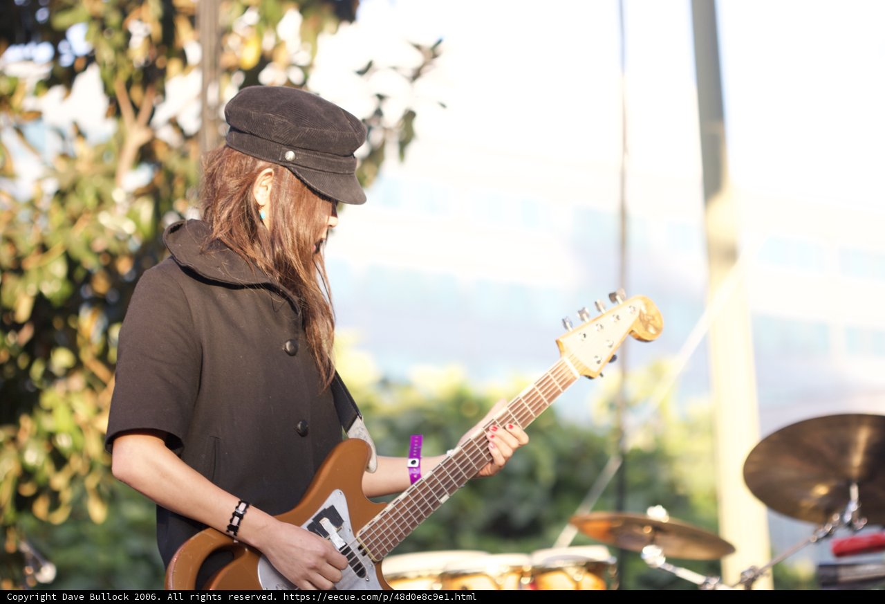 Solo Performance: Woman Playing the Guitar