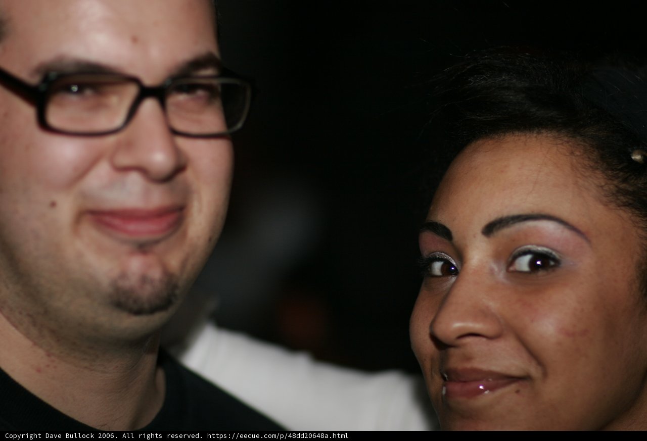 Smiling Couple Wearing Glasses