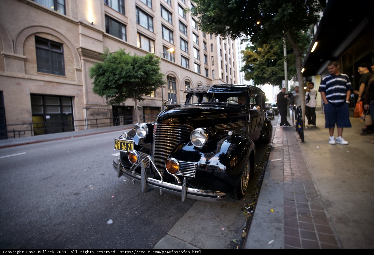 Vintage Coupe on the City Sidewalk