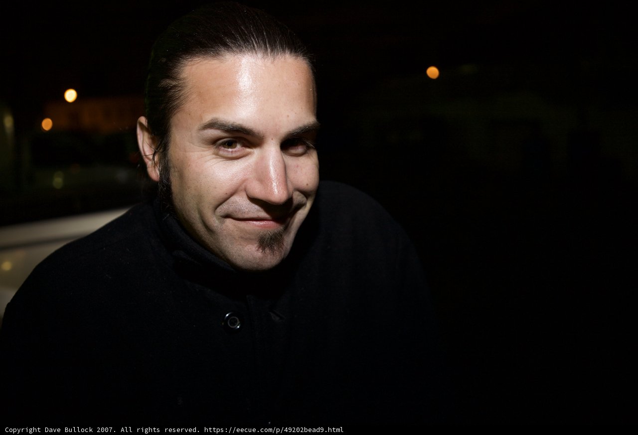 Happy Man in Black Shirt