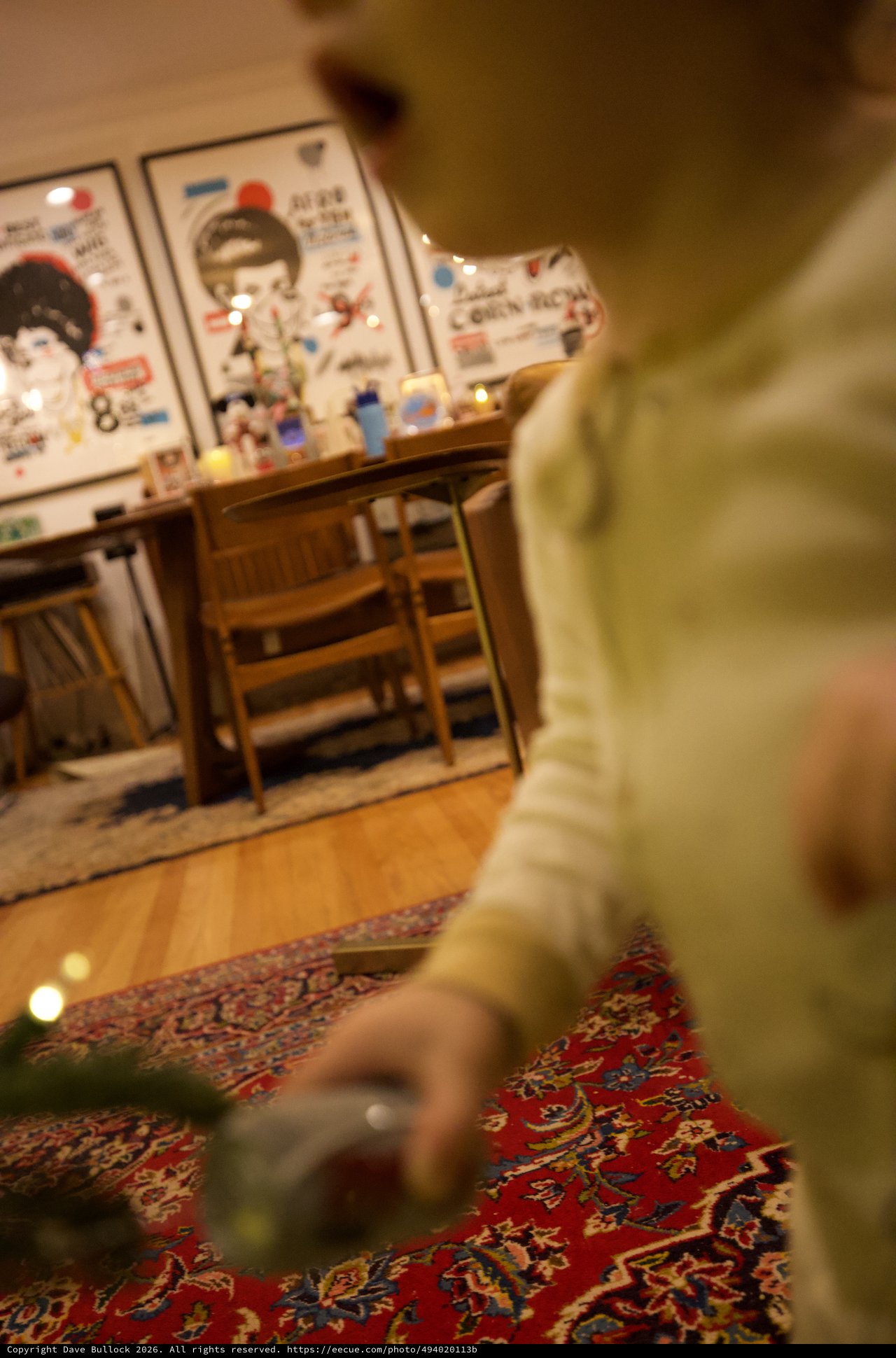 Child Playing on Colorful Oriental Rug in Cozy Room