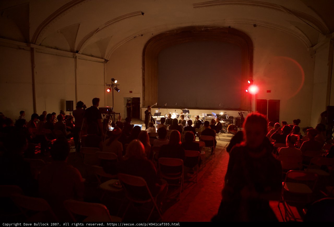 Red-Lit Audience in Theater