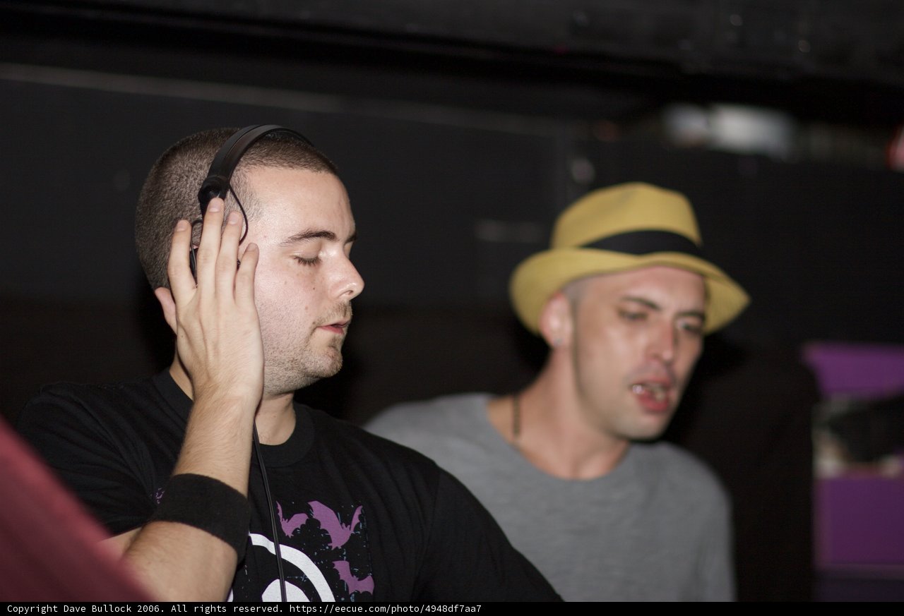 Two Men Jamming with Headphones