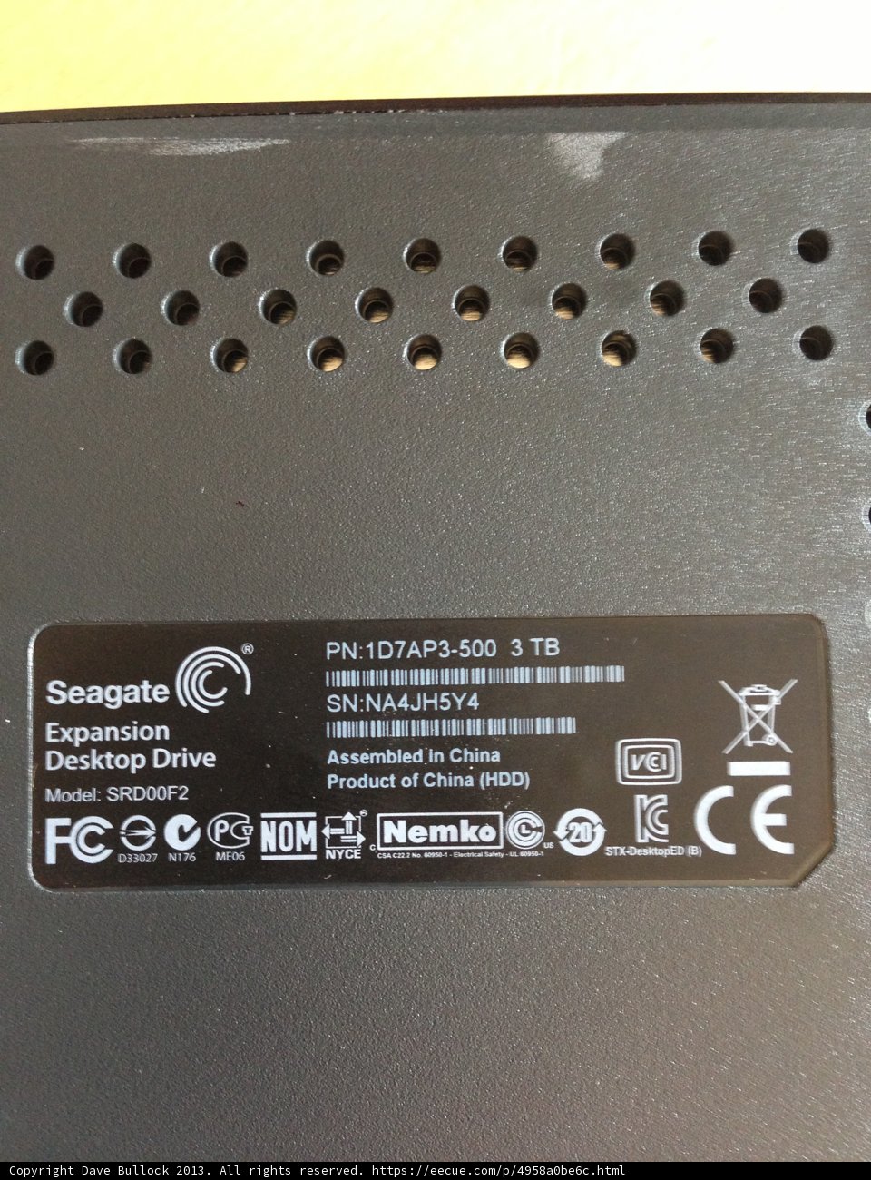 Back of Black Computer with Adapter Sticker