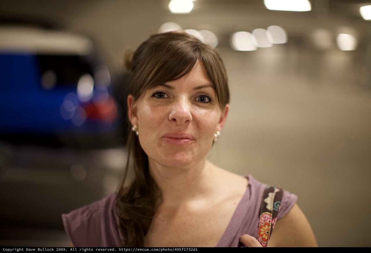 Woman in Parking Garage with Warm Evening Light