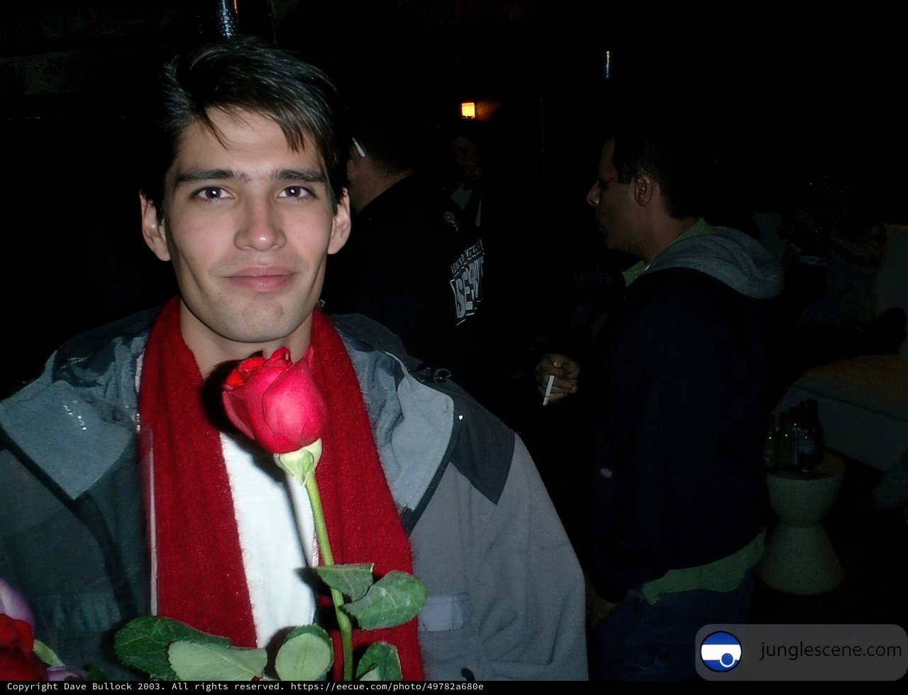 Man Holding a Rose