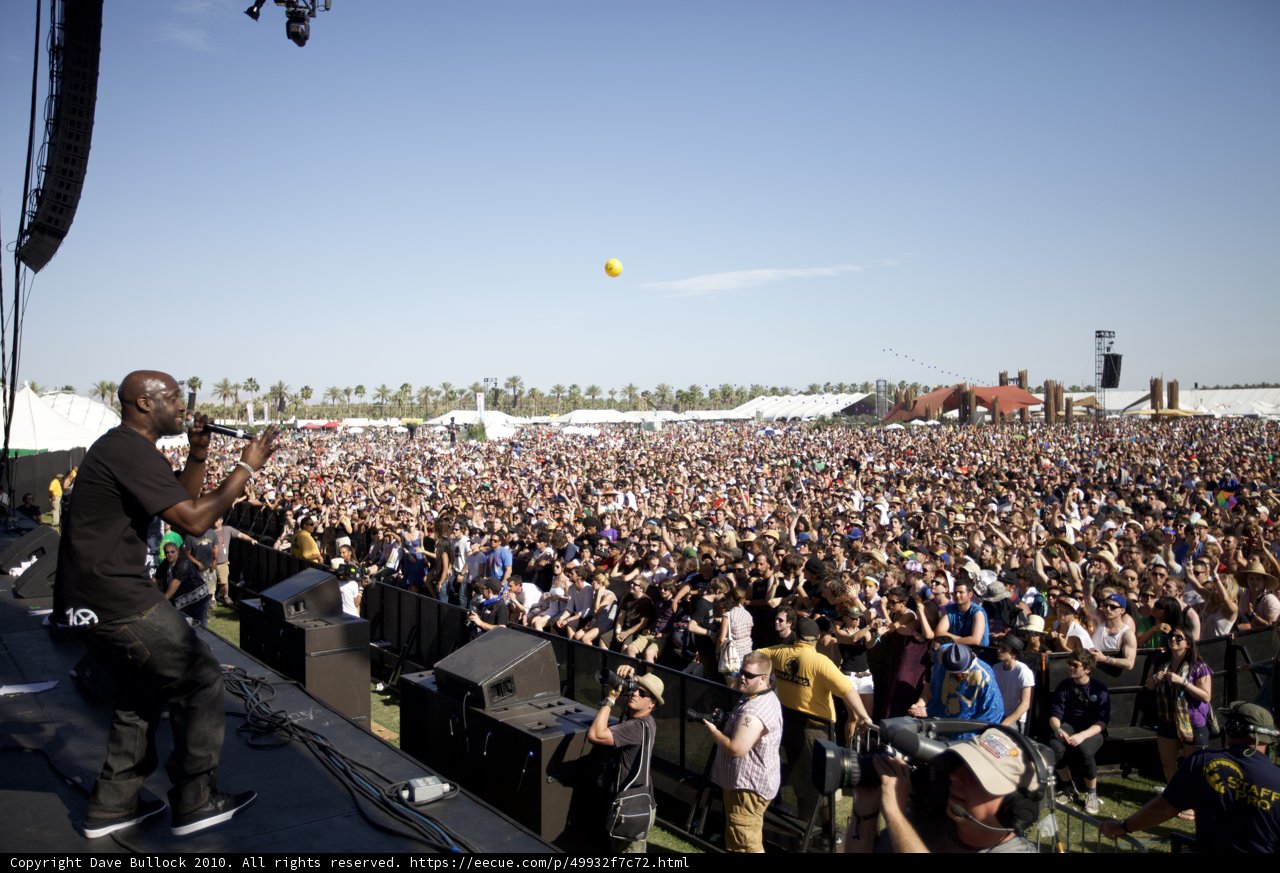 Man with Yellow Ball on Stage