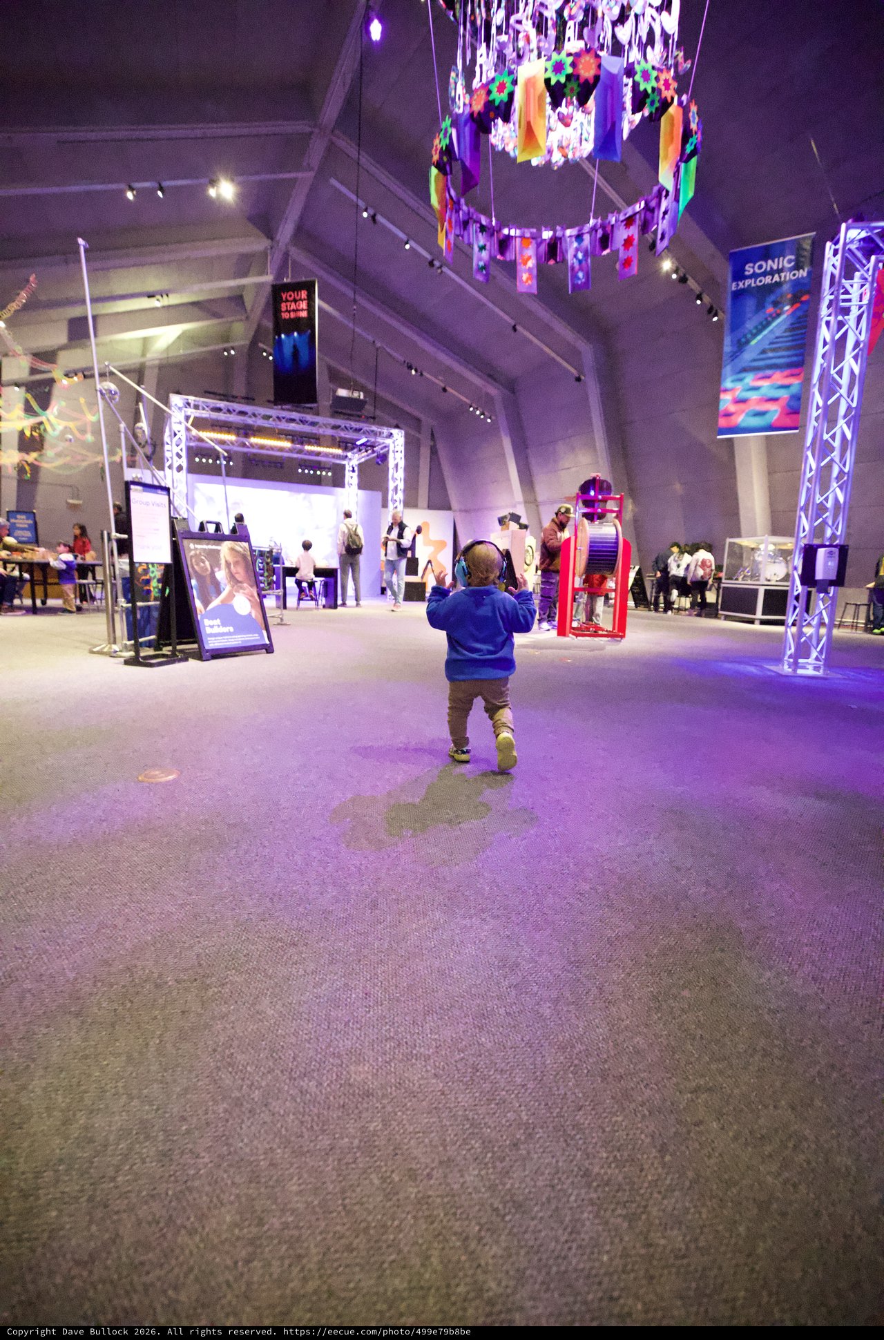 Child Explores Interactive Museum Exhibition Space