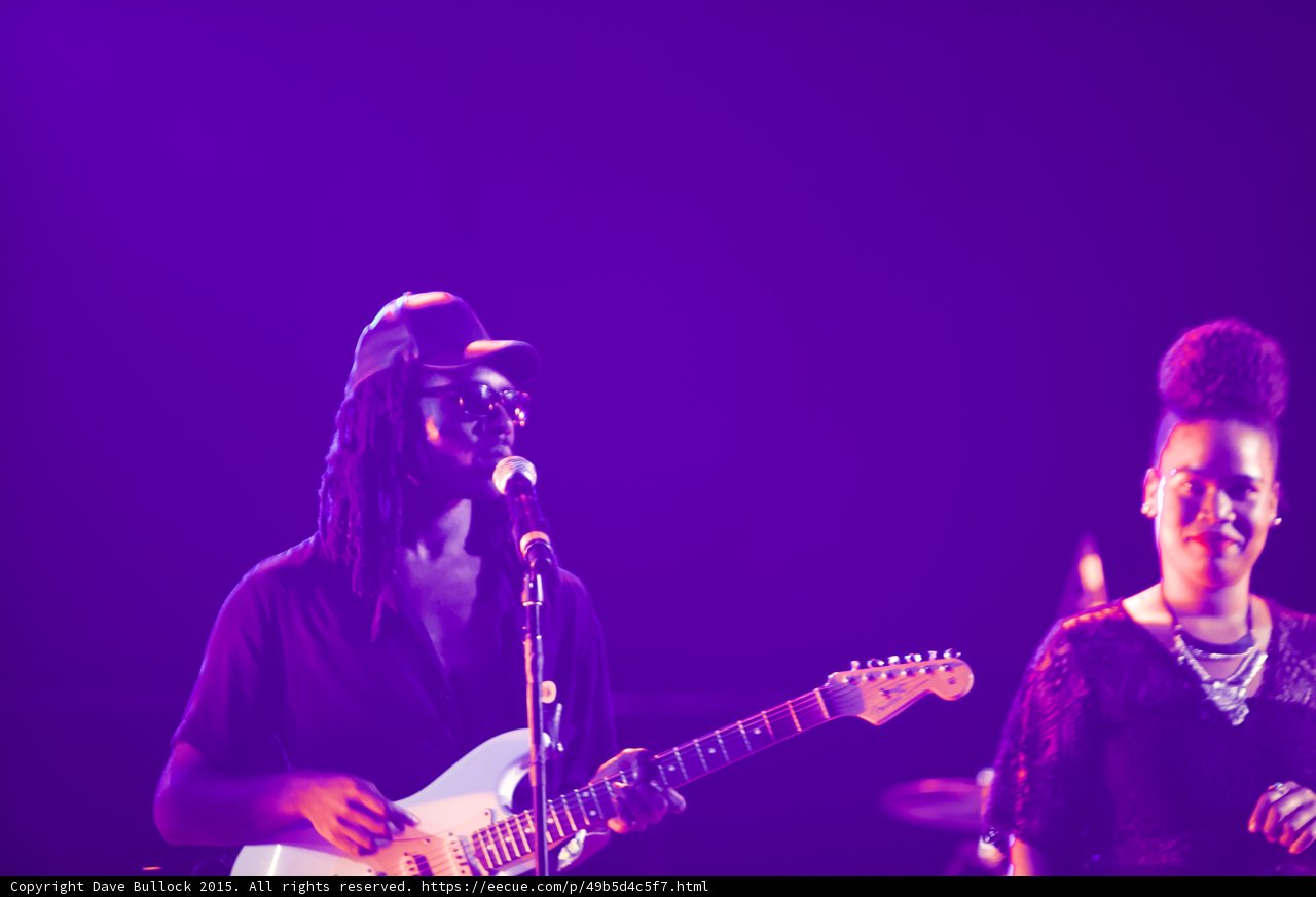 Solange Band Guitarist Singing White Stratocaster Backing Vocalist Smiling Purple