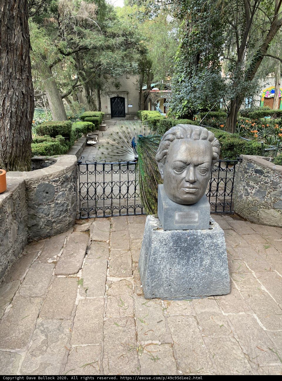Man of Stone in a Serene Park