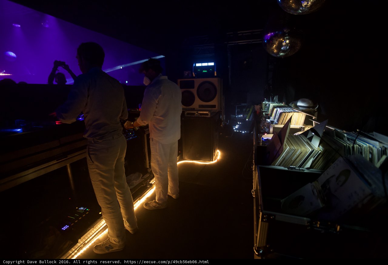 Men in White Outfits on Coachella Stage
