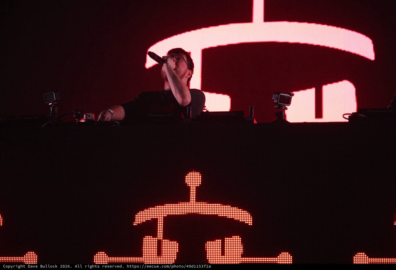 DJ Performs at Wobbleland Festival Under Red Lights