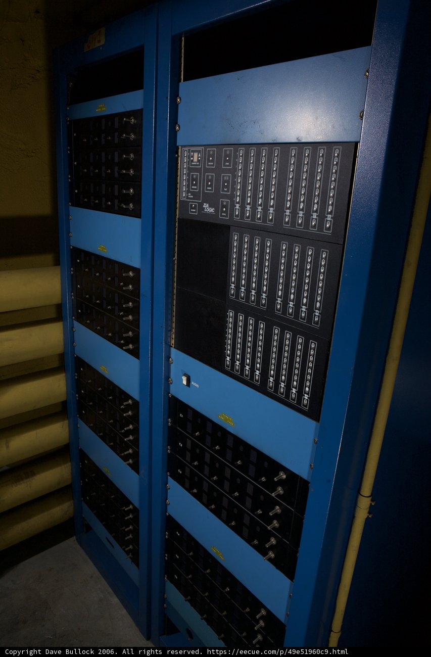 Blue computer rack with diverse hardware