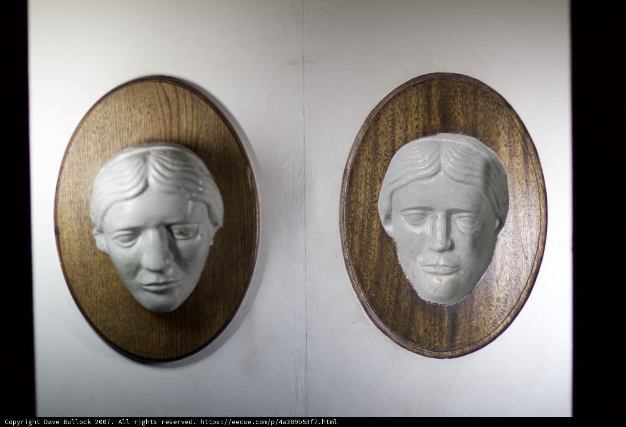 Illuminated Faces on Wooden Frames