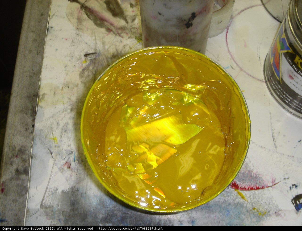 Yellow Paint Bucket on Table