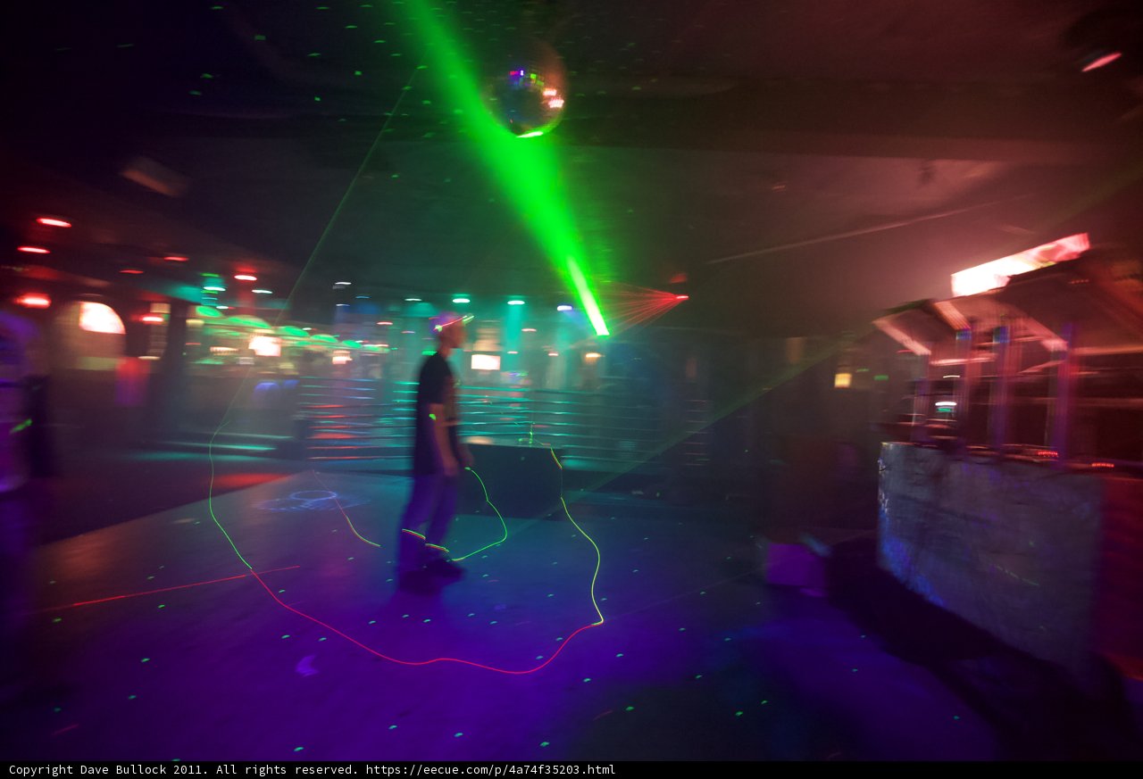 Urban Nightlife Under the Lasers