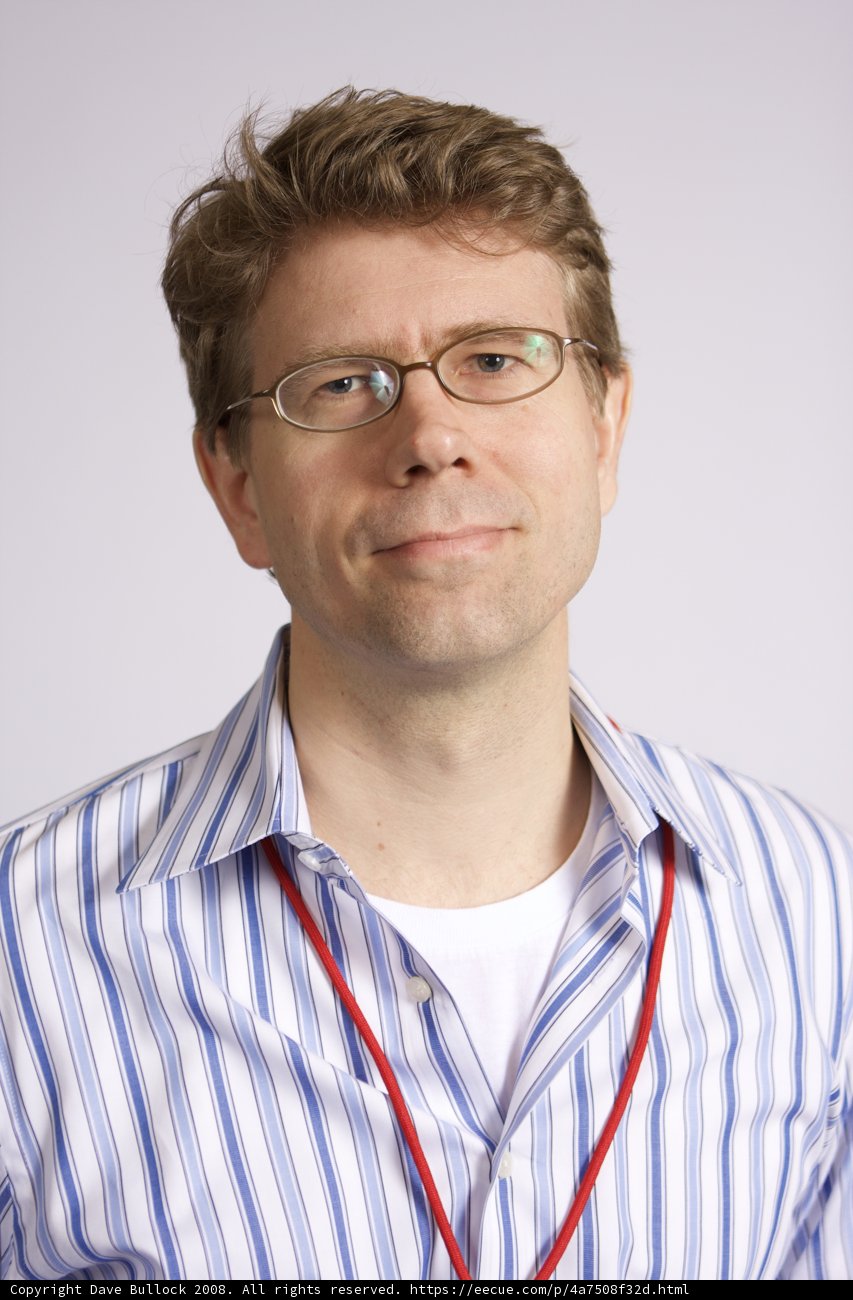 The Happy Man with Glasses