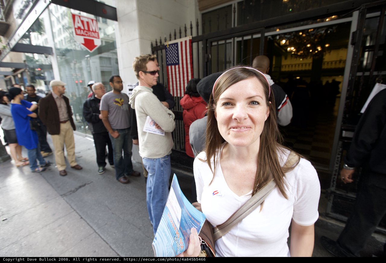 Smiling Voter Waits in Line on Election Day 2008