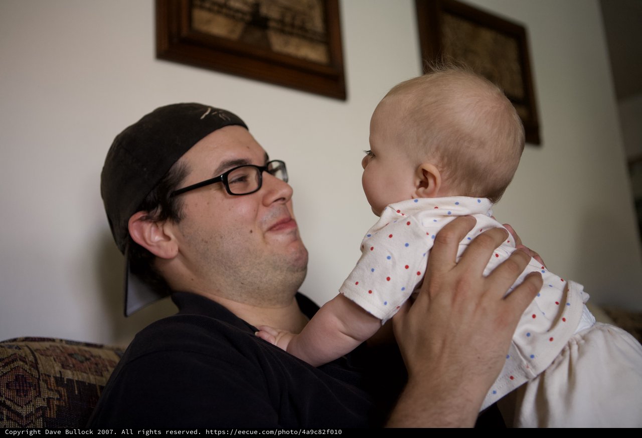 Father and Baby Share a Tender Moment Indoors