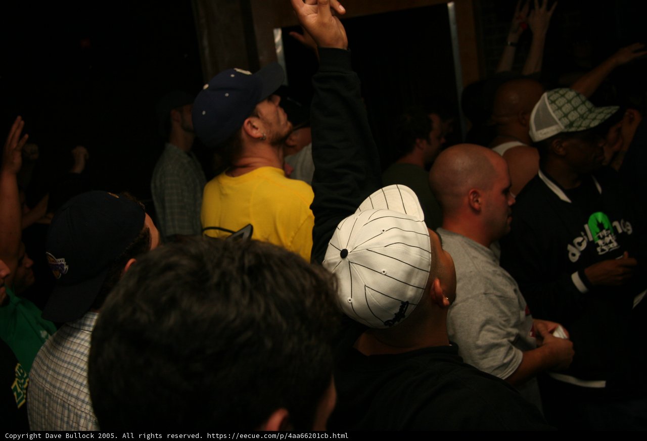 Partygoers Celebrate the End of Summer with Baseball Caps