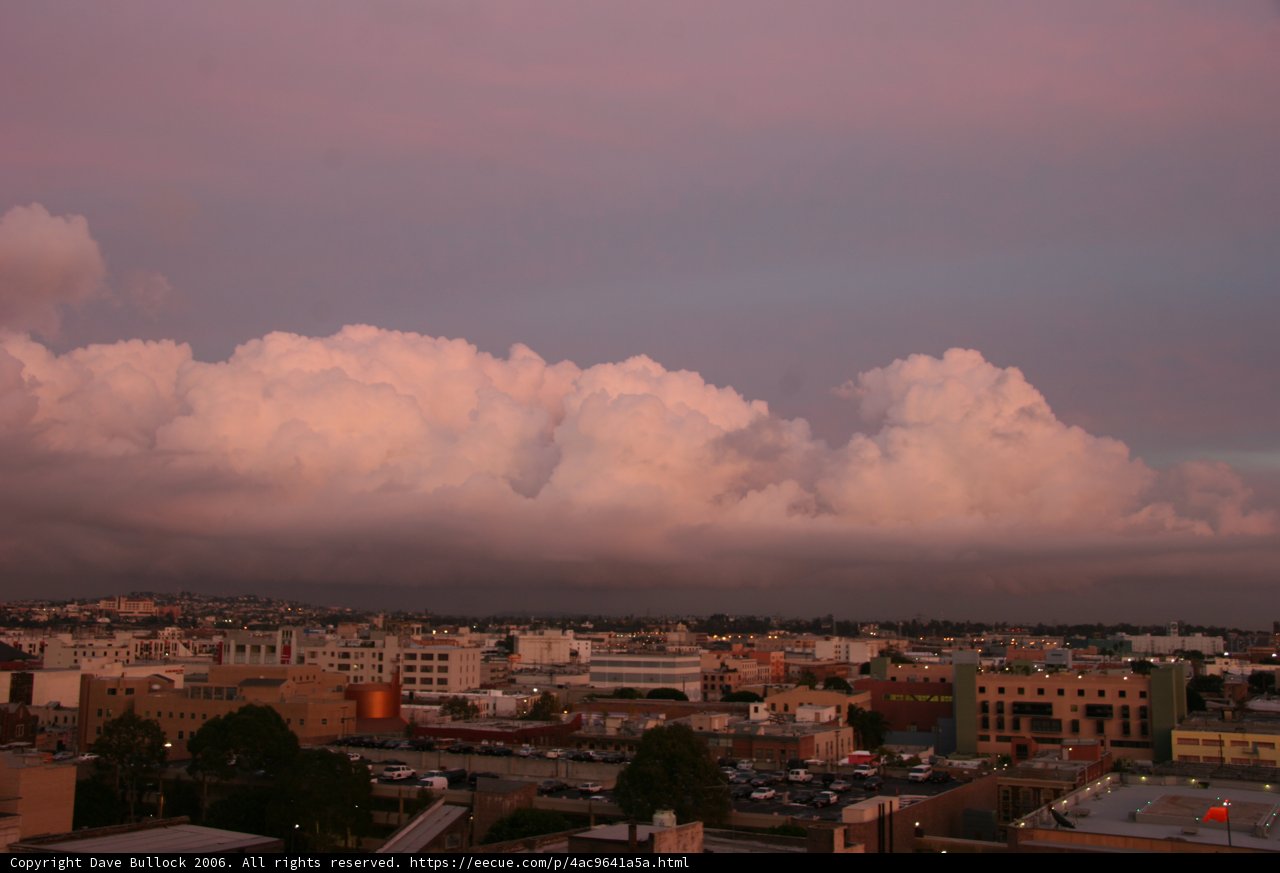 Pink Clouds Float Above the Cityscape