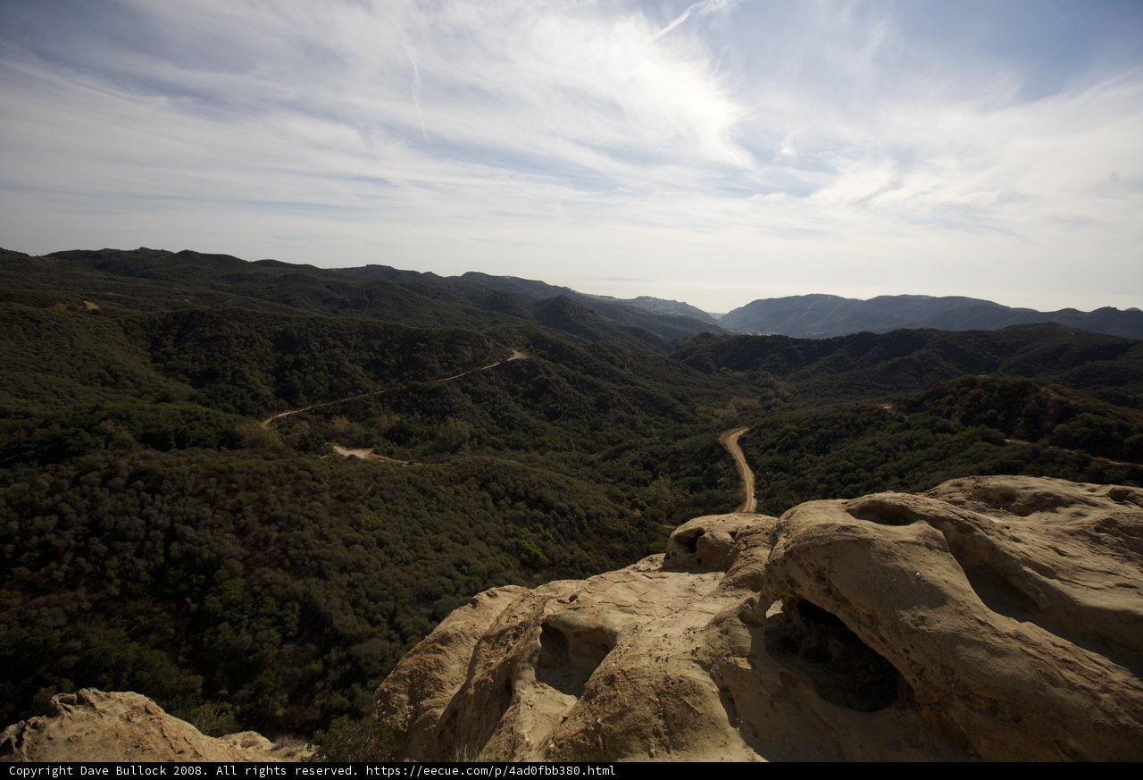 Majestic Peaks overlooking a winding Road